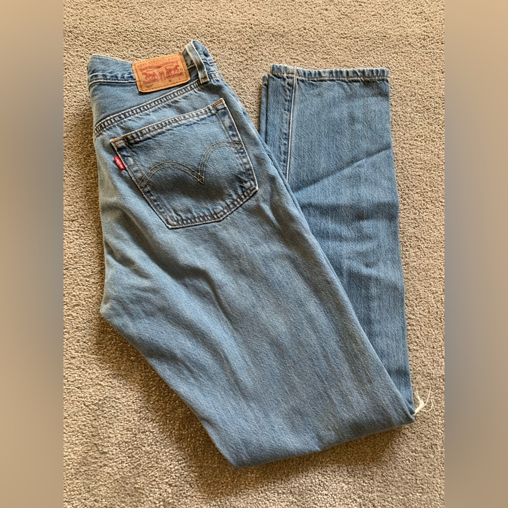 Levi’s 501 distressed Jeans.
